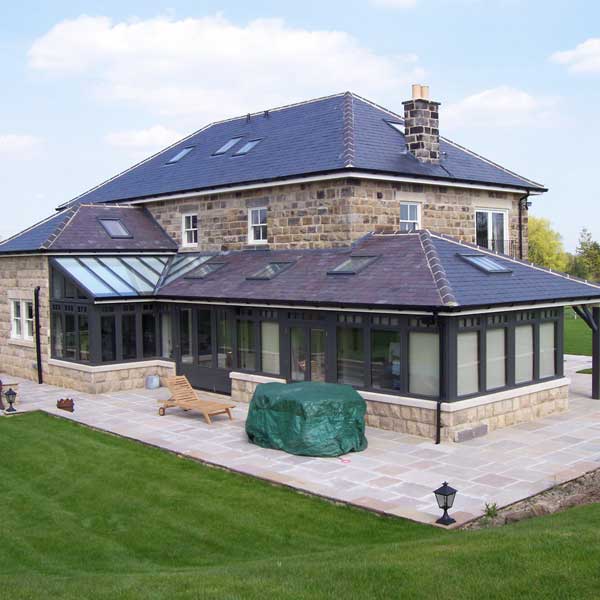 A large timber conservatory used as an extension