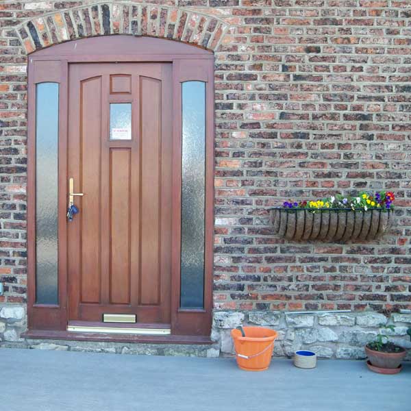 Traditional timber front door in a cottage