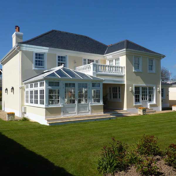 A white timber conservatory to suit a traditional property
